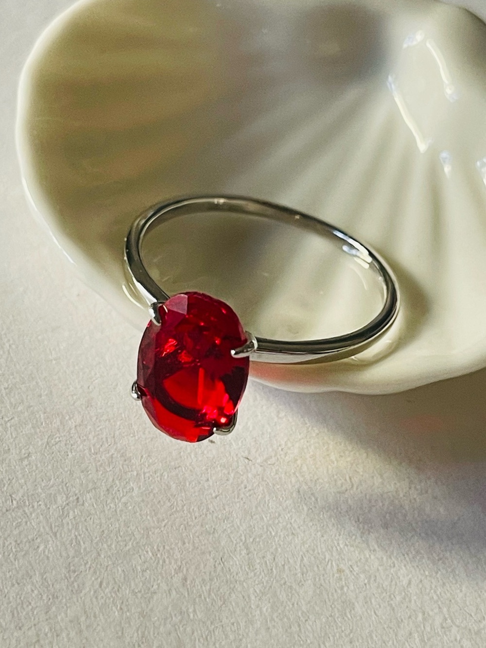 Polished Silver band Ring with Red Oval Gemstone solitaire
